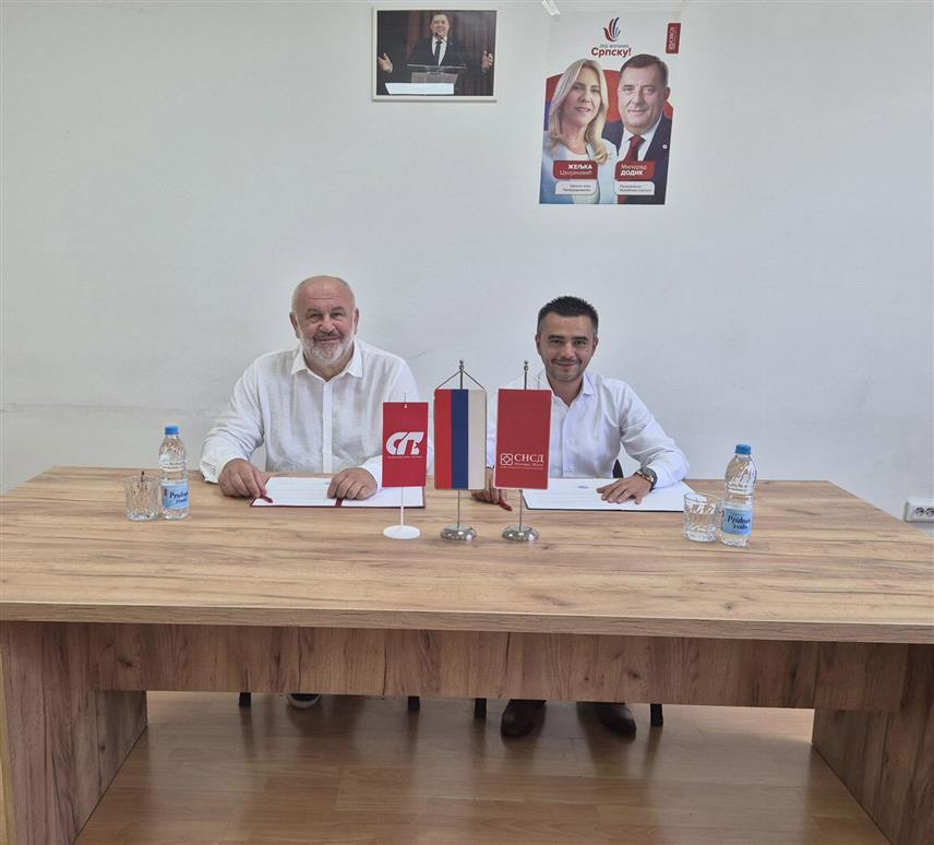 КОЗАРСКА ДУБИЦА, 12. СЕПТЕМБРА /СРНА/ - Предсједници општинских одбора Савеза независних социјалдемократа /СНСД/ и Социјалистичке партије /СП/ у Козарској Дубици Игор Савковић и Душко Милуновић потписали су данас коалициони споразум о регулисању односа у току предизборне кампање, формирања и вршења локалне власти у наредном четворогодишњем периоду	
