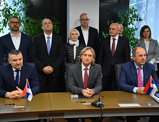 SETTLEMENT AGREEMENT SIGNED, ARBITRATION SUSPENDED IN WASHINGTON