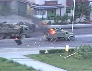MUSLIM FORCES MASSACRED JNA CONVOY IN TUZLA