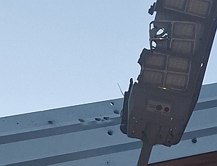 FIREARM SHOTS HIT LIGHTING AT SERB GATHERING PLACE