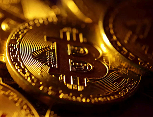 ЦИЈЕНА БИТКОИНА ПРЕМАШИЛА 71.000 ДОЛАРА