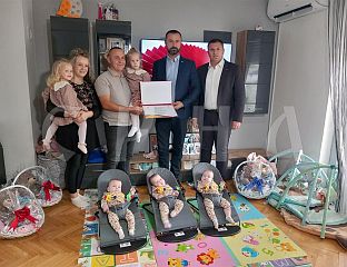 GIFTS AND BAM 3,000 VOUCHER TO FAMILY WITH FIVE DAUGHTERS